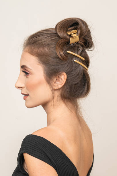 istock Woman With Hair Clips 1220413584