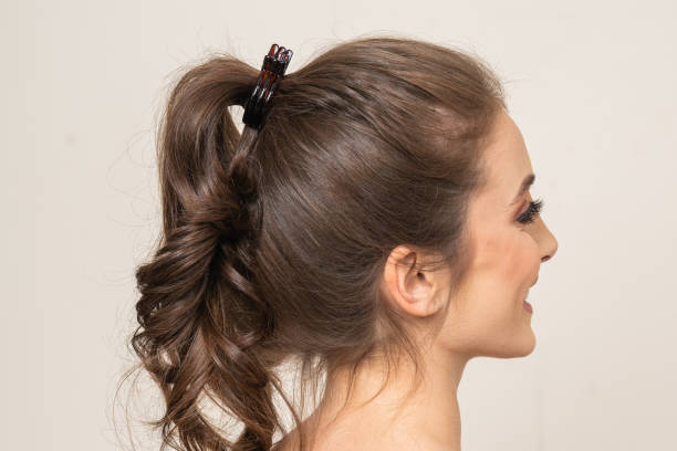 istock Woman With Hair Clips 1220413591