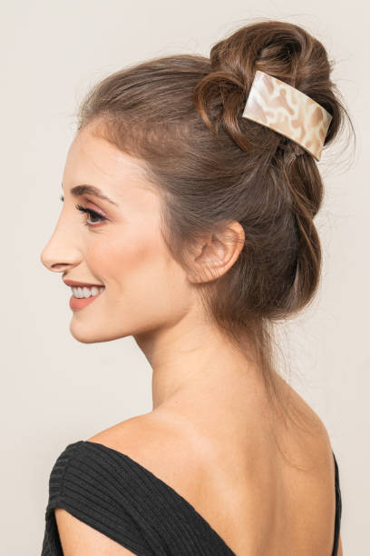 istock Woman With Hair Clips 1220413598