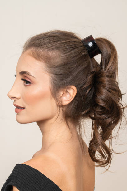 istock Woman With Hair Clips 1220413642