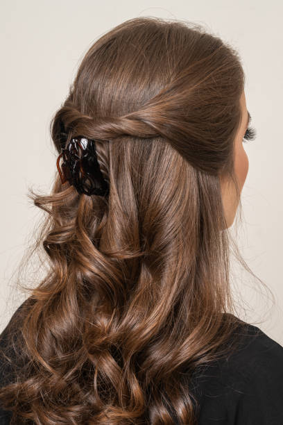 istock Woman With Hair Clips 1220413773