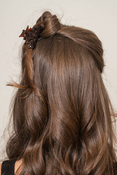 istock Woman With Hair Clips 1220413852
