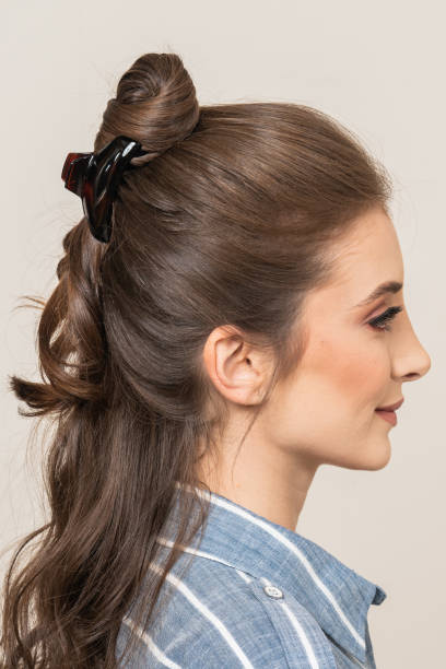 istock Woman With Hair Clips 1220413898