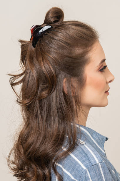 istock Woman With Hair Clips 1220413937