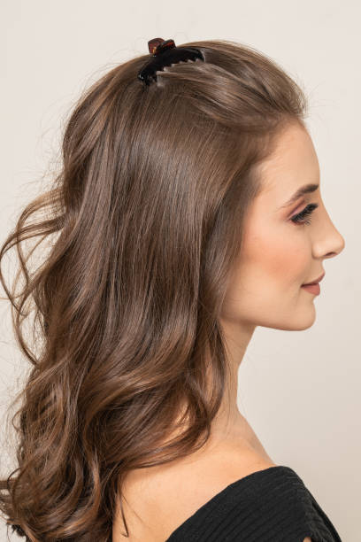 istock Woman With Hair Clips 1220414070