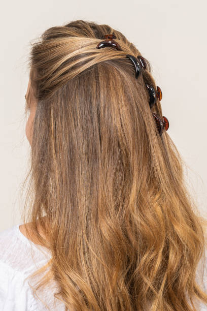 istock Woman With Hair Clips 1220414076