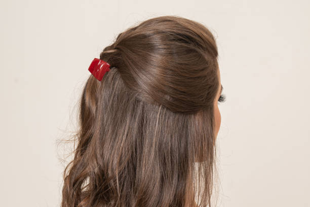 istock Woman With Hair Clips 1220414128