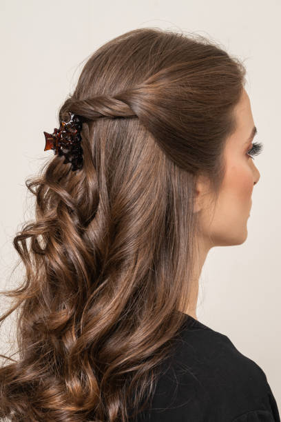 istock Woman With Hair Clips 1220414151