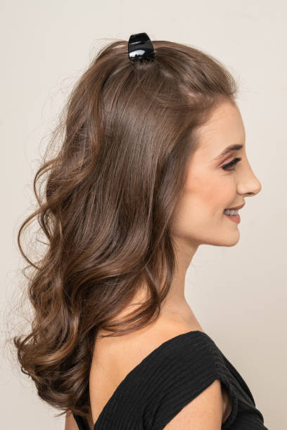 istock Woman With Hair Clips 1220414158