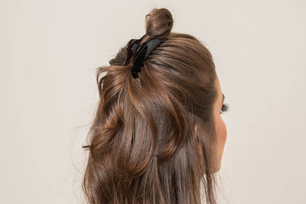 istock Woman With Hair Clips 1220414172