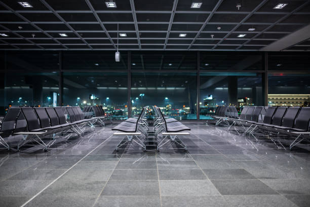 Empty chairs at the airport Frankfurt Airport, Germany: Empty chairs at the Frankfurt Airport at night. frankfurt international airport stock pictures, royalty-free photos & images