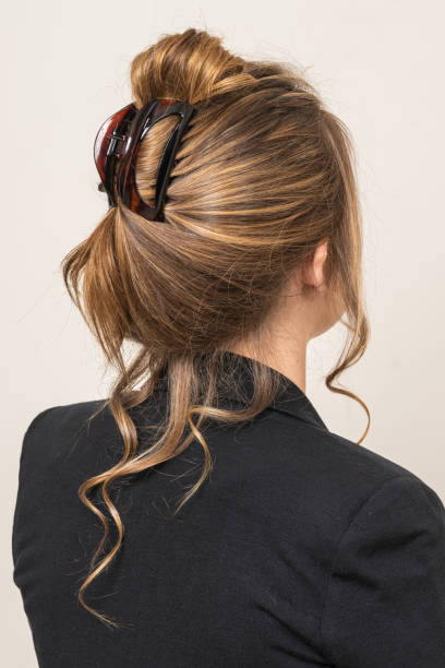 istock Woman With Hair Clips 1220418244