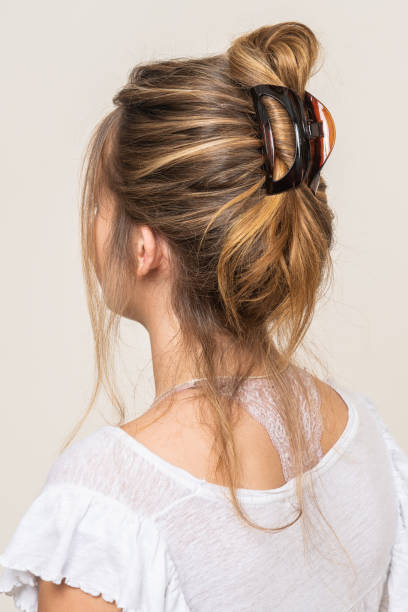 istock Woman With Hair Clips 1220418290