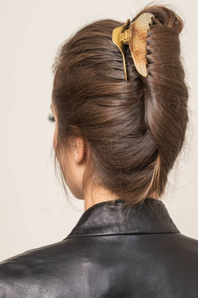 istock Woman With Hair Clips 1220418366
