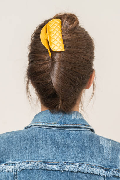 istock Woman With Hair Clips 1220418391