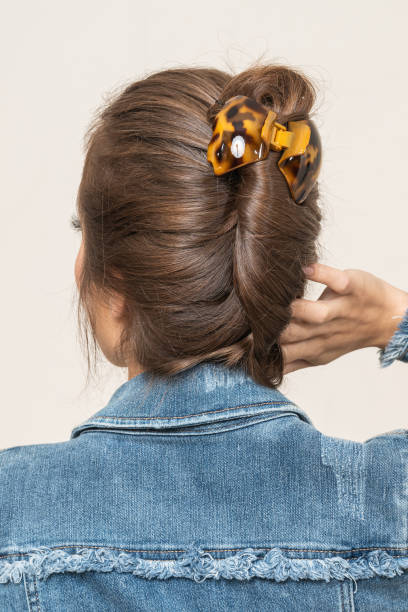 istock Woman With Hair Clips 1220418423