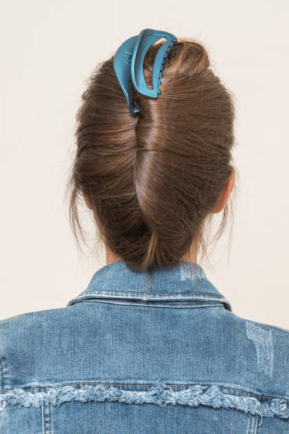 istock Woman With Hair Clips 1220418474