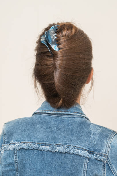 istock Woman With Hair Clips 1220418513
