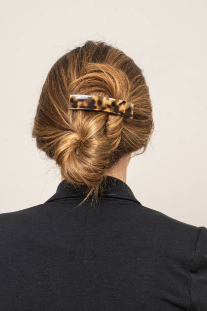 istock Woman With Hair Clips 1220418519