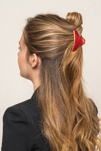 istock Woman With Hair Clips 1220418551