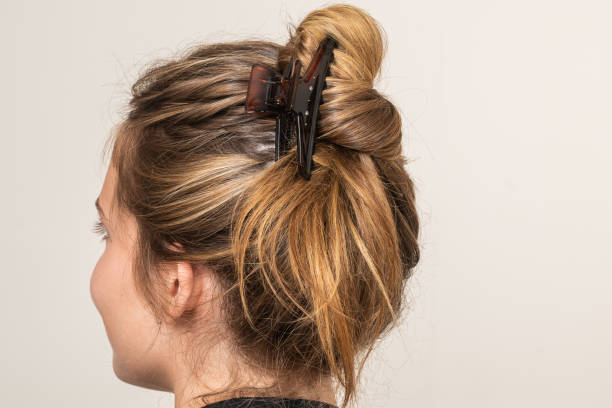 istock Woman With Hair Clips 1220418614