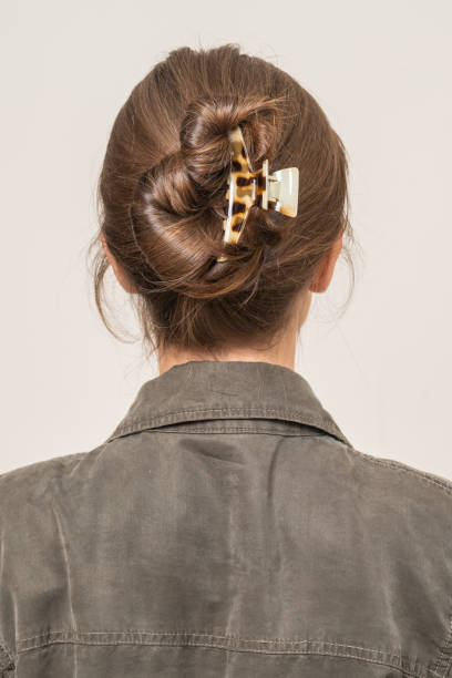 istock Woman With Hair Clips 1220418643