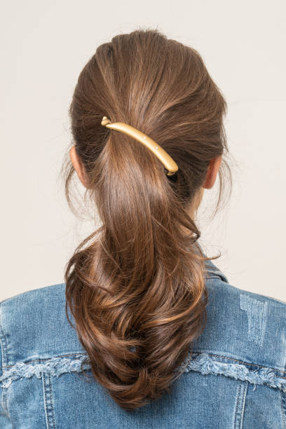 istock Woman With Hair Clips 1220418705