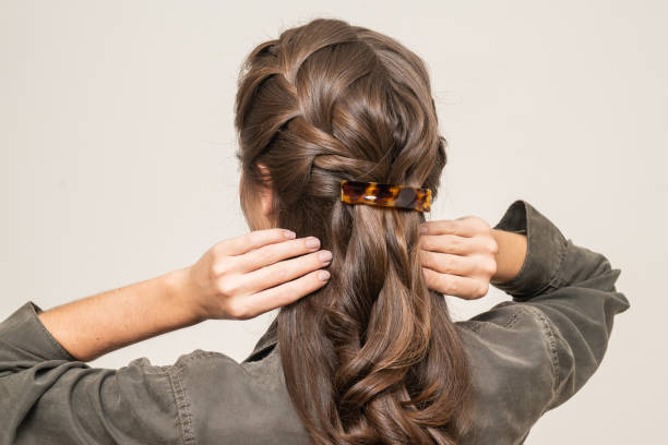istock Woman With Hair Clips 1220418857