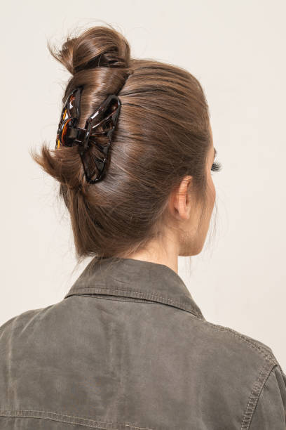 istock Woman With Hair Clips 1220419434
