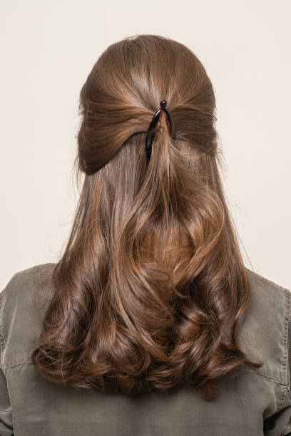 istock Woman With Hair Clips 1220419467