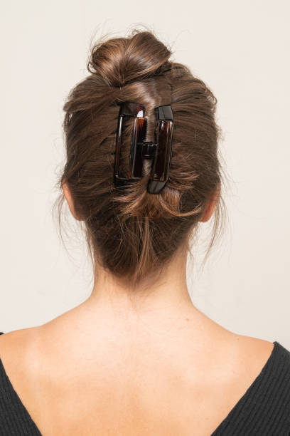 istock Woman With Hair Clips 1220419468