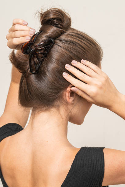 istock Woman With Hair Clips 1220419469