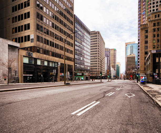 Montreal Deserted Boulevard René-Lévesque during Covid 19 crisis Montreal Deserted boulevard René-Lévesque during Covid 19 crisis. The usually crowded boulevard is lined with office buildings, stores and cafes. city street stock pictures, royalty-free photos & images