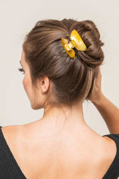 istock Woman With Hair Clips 1220420356