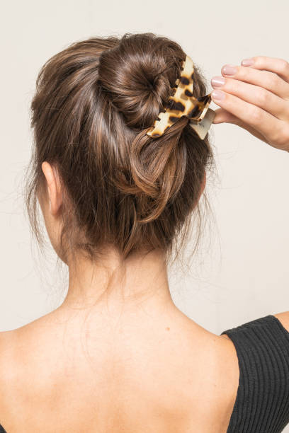 istock Woman With Hair Clips 1220420940