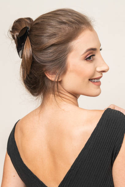 istock Woman With Hair Clips 1220420946