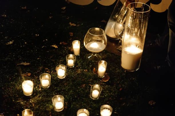 istock romantic candle light in glass lanterns at luxury wedding ceremony in evening, decor and arrangements 1220420948