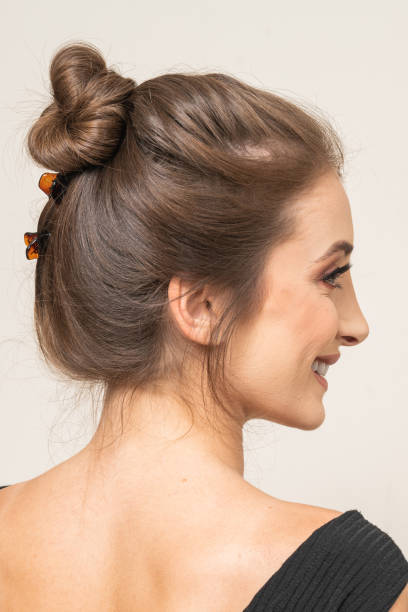 istock Woman With Hair Clips 1220420985