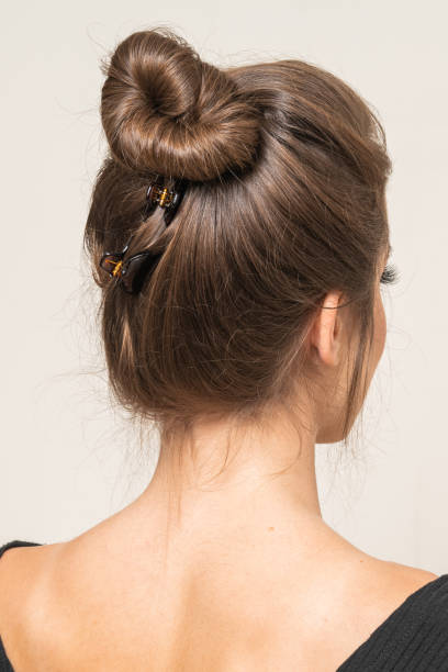 istock Woman With Hair Clips 1220420990