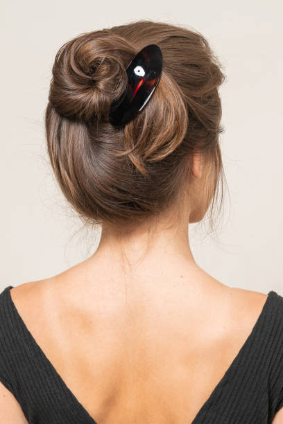 istock Woman With Hair Clips 1220420999