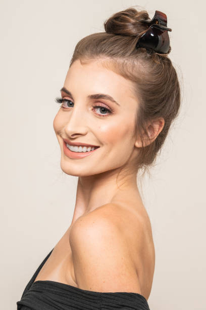 istock Woman With Hair Clips 1220421117
