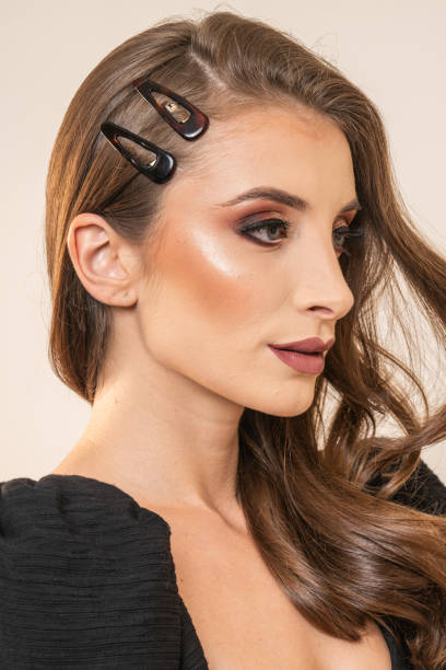 istock Woman With Hair Clips 1220421339