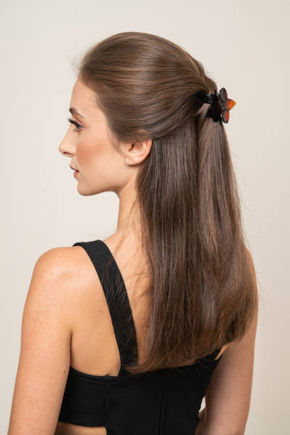 istock Woman With Hair Clips 1220421558
