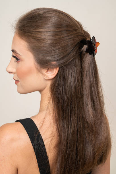 istock Woman With Hair Clips 1220421874