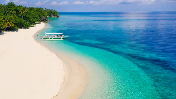 istock Tropical island with a white beach. Mahaba Island, Philippines 1220421894