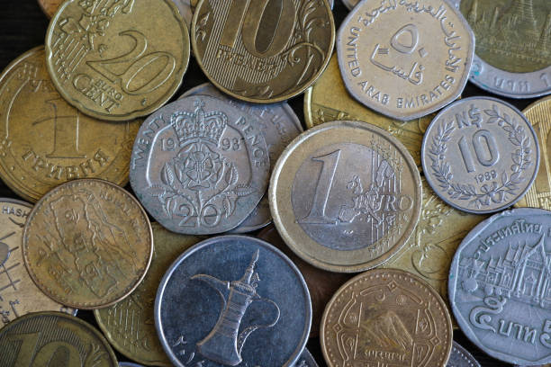 istock collection of coins of different countries 1220422817
