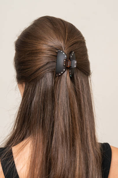 istock Woman With Hair Clips 1220423221