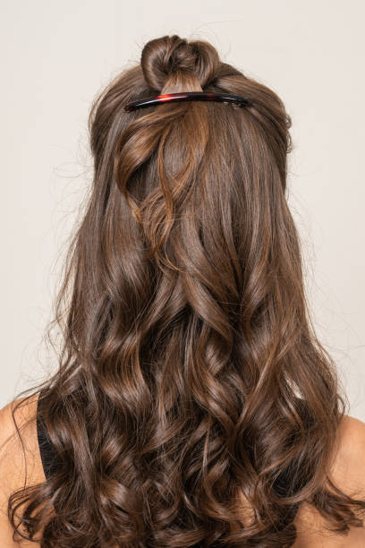 istock Woman With Hair Clips 1220423224