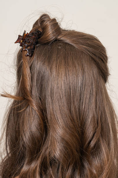 istock Woman With Hair Clips 1220423304