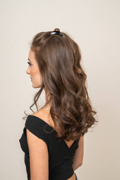 istock Woman With Hair Clips 1220423371
